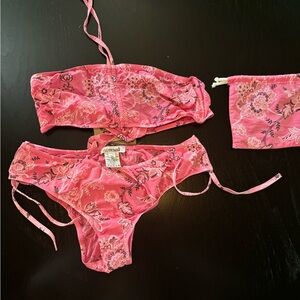 Girls swimsuit bikini new with tags never worn. fits in a bag that it comes with